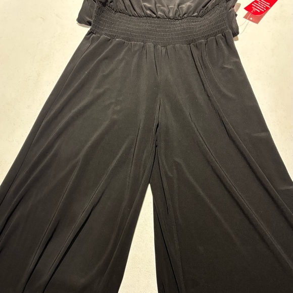 New Elegant Black Women's Jumpsuit, spandex, size small - Picture 1 of 4
